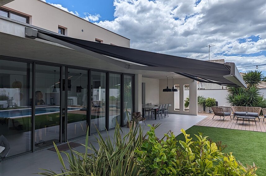 Installation d'un store banne HAROL à Juvignac