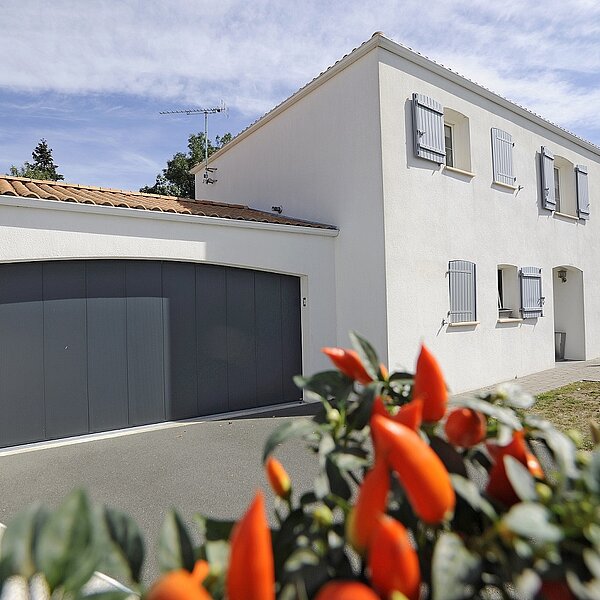 Confort, esthétique et sécurité pour votre porte de garage